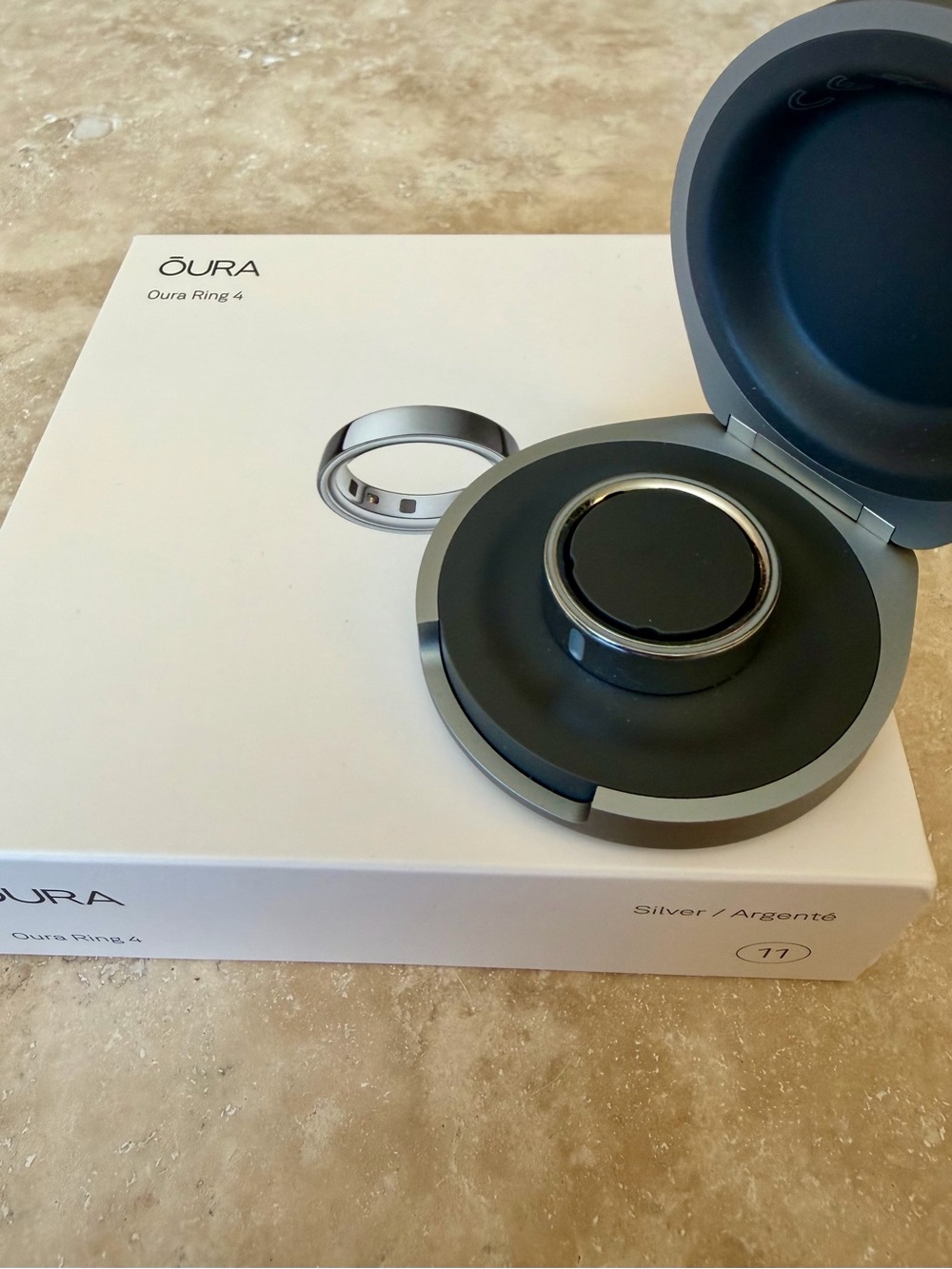 Oura Ring 4 Silver with Dark Gray Charging Case